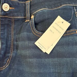 NWT Of luck Deep Blue Denim Jeans retail $99. Size 14. Super stretch!